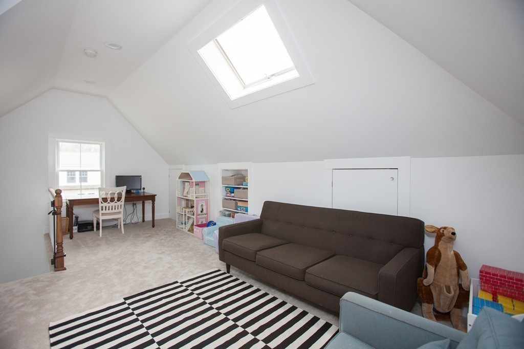 41 Forest Street Wellesley, MA 02481 - Photo 19 of 23 a living room with furniture and a window