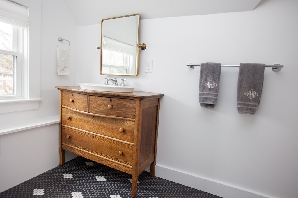 41 Forest Street Wellesley, MA 02481 - Photo 20 of 23 a view of an empty room with window and cabinet