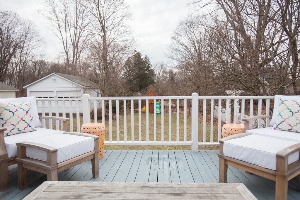 41 Forest Street Wellesley, MA 02481 - Photo 21 of 23 a view of a wooden dinning table and chairs in the deck