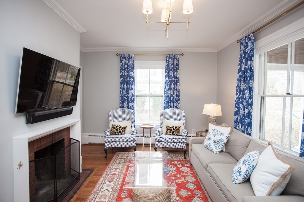 41 Forest Street Wellesley, MA 02481 - Photo 4 of 23 a living room with furniture fireplace and flat screen tv