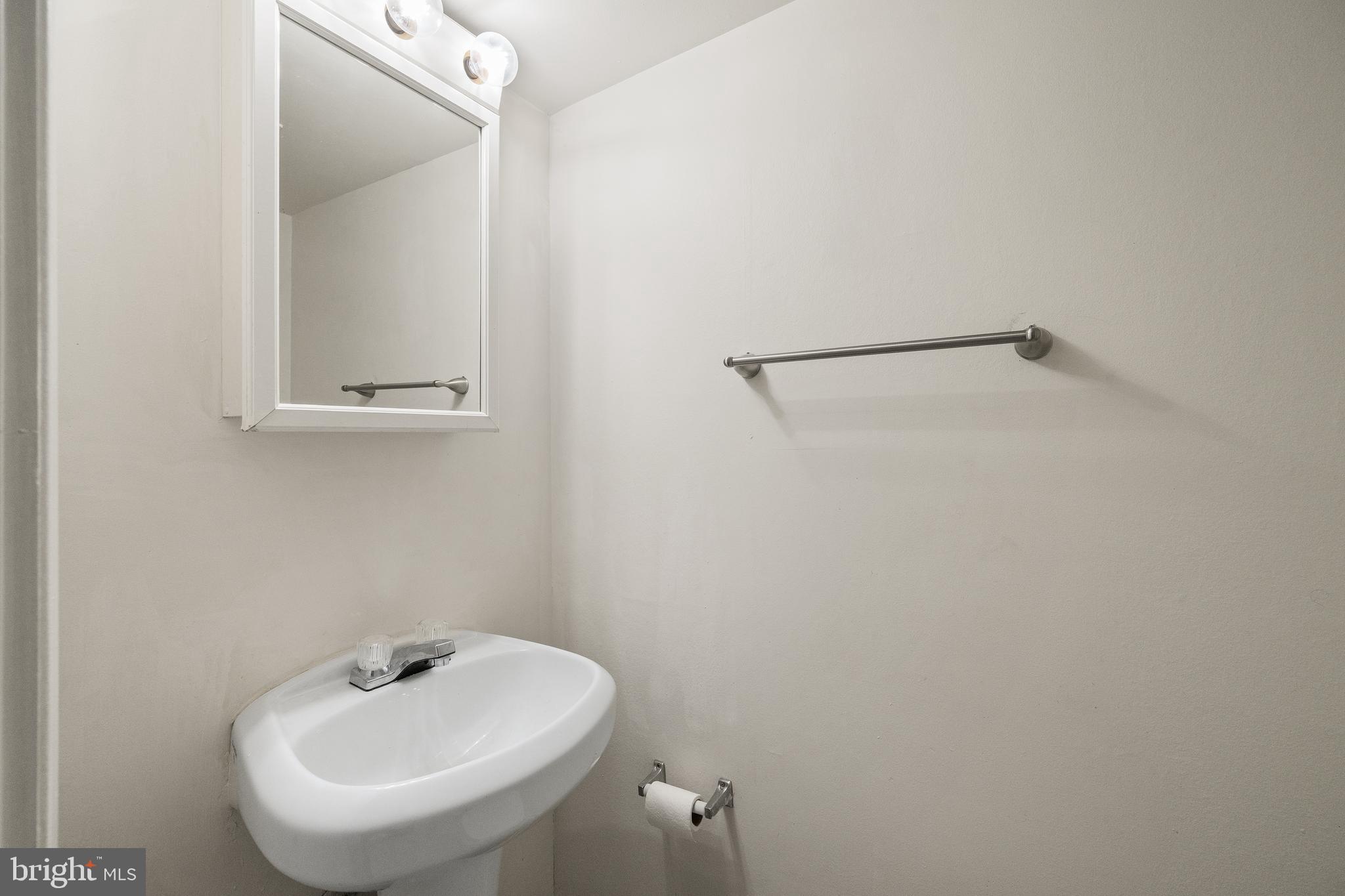 5407 Fallriver Row Court Columbia, MD 21044 - Photo 15 of 39 Half bathroom on main level
