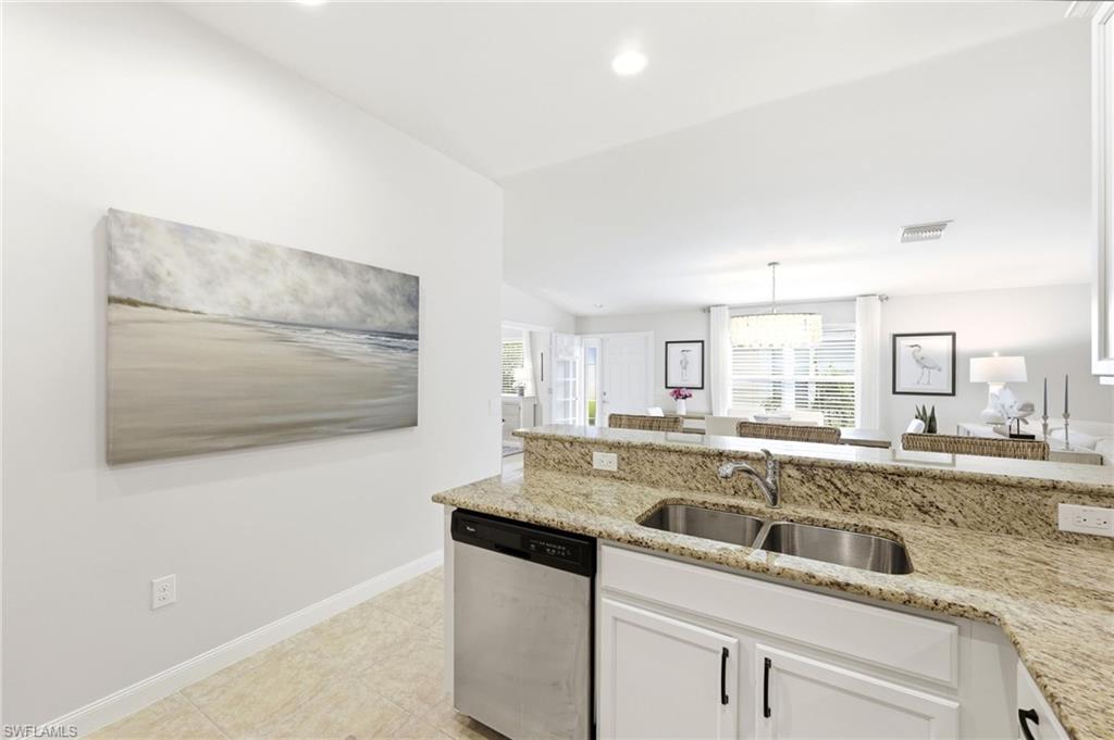 8658 Genova Court Naples, FL 34114 - Photo 11 of 49 Open Kitchen with access to Living/Dining Area