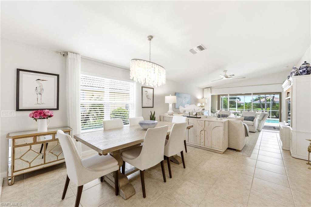 8658 Genova Court Naples, FL 34114 - Photo 13 of 49 Dining Area and Livin Area in the background