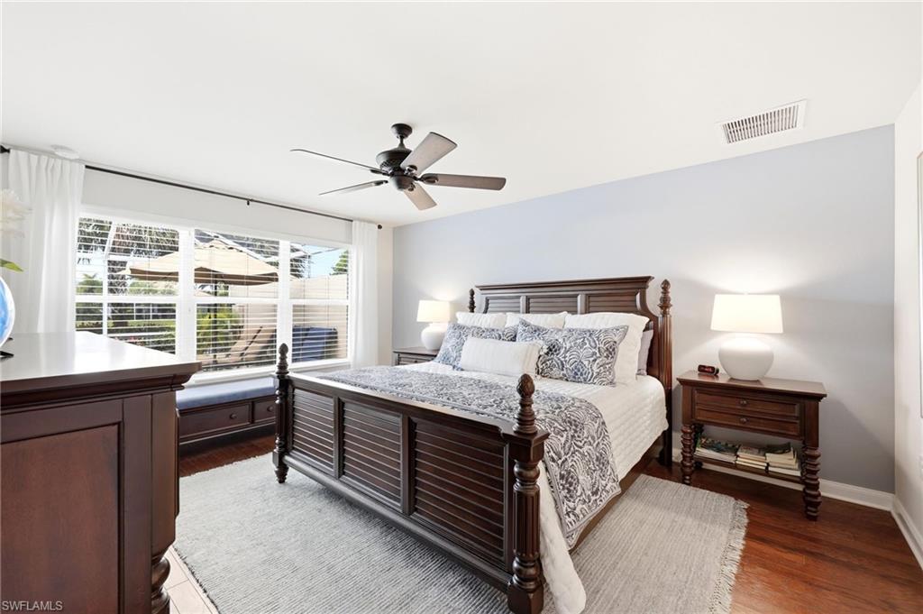 8658 Genova Court Naples, FL 34114 - Photo 16 of 49 Mastedr Bedroom facing Pool and Lake