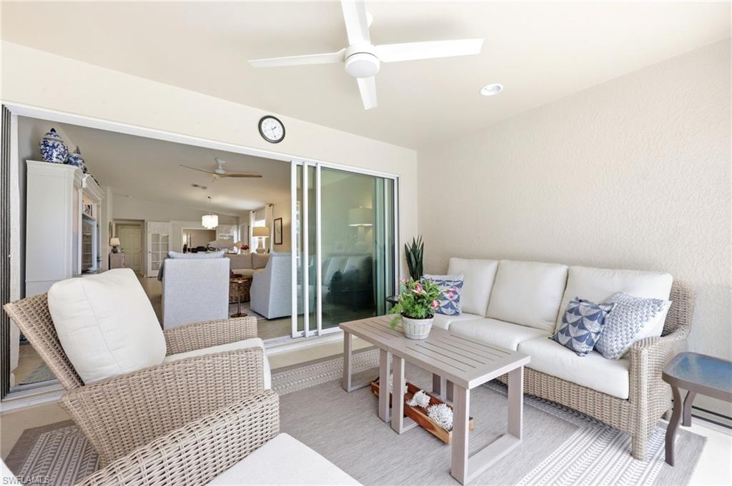 8658 Genova Court Naples, FL 34114 - Photo 26 of 49 Covered outdoor Patio with Sliding Doors