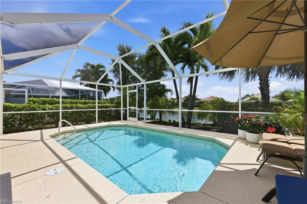8658 Genova Court Naples, FL 34114 - Photo 3 of 49 Fully screened-in Patio with heated Pool, Lake views and southern exposure