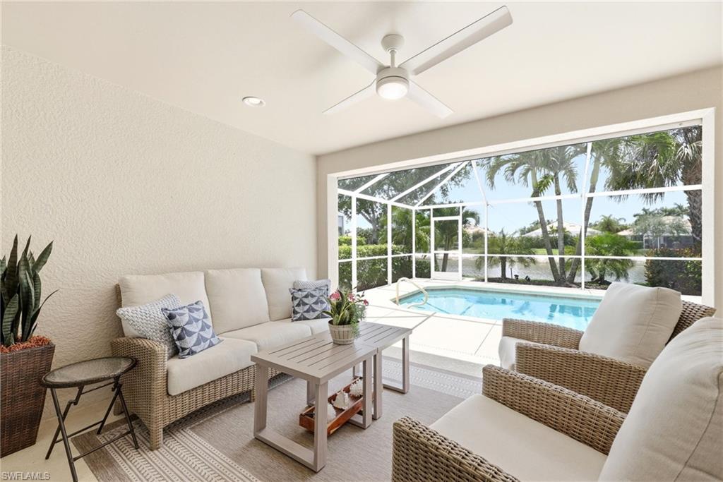 8658 Genova Court Naples, FL 34114 - Photo 4 of 49 Covered outdoor space and Pool deck