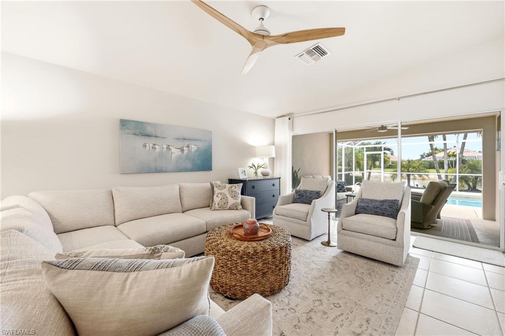 8658 Genova Court Naples, FL 34114 - Photo 6 of 49 Living Room and outdoor space