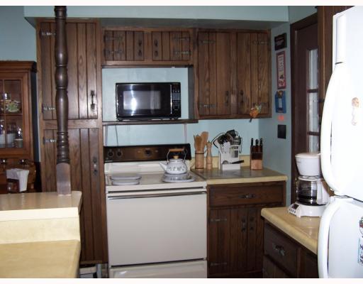 105 2nd Street Butler, PA 16001 - Photo 4 of 17 Kitchen. A large pantry cupboard is conveniently located next to the range.