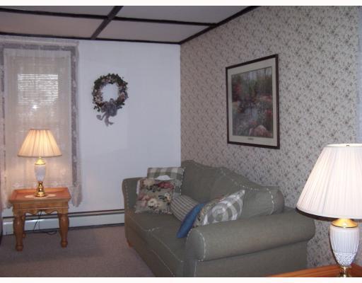 105 2nd Street Butler, PA 16001 - Photo 8 of 17 Living Room. A large living room is tastefully done & offers plenty of space to accomodate your family & guests.