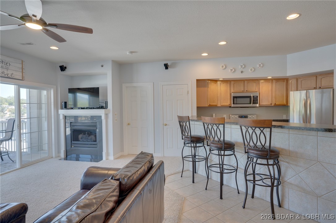 68 Lighthouse Road, Unit 231 Lake Ozark, MO 65049 - Photo 5 of 45 The Livingroom