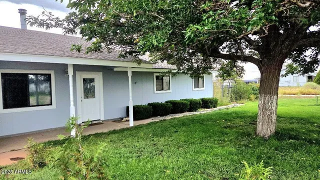 a house view with a garden space