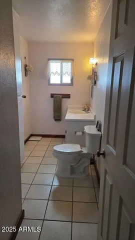 a view of room with furniture and a window