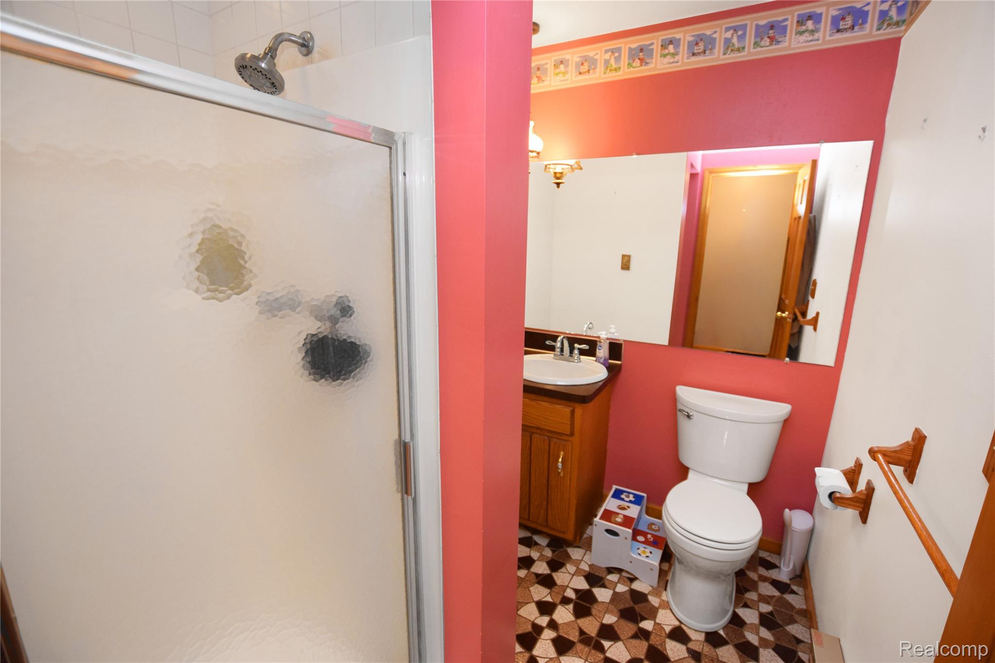 3910 Joy Road Metamora, MI 48455 - Photo 15 of 26 Full bath with tile patterned floors, a shower stall, and vanity