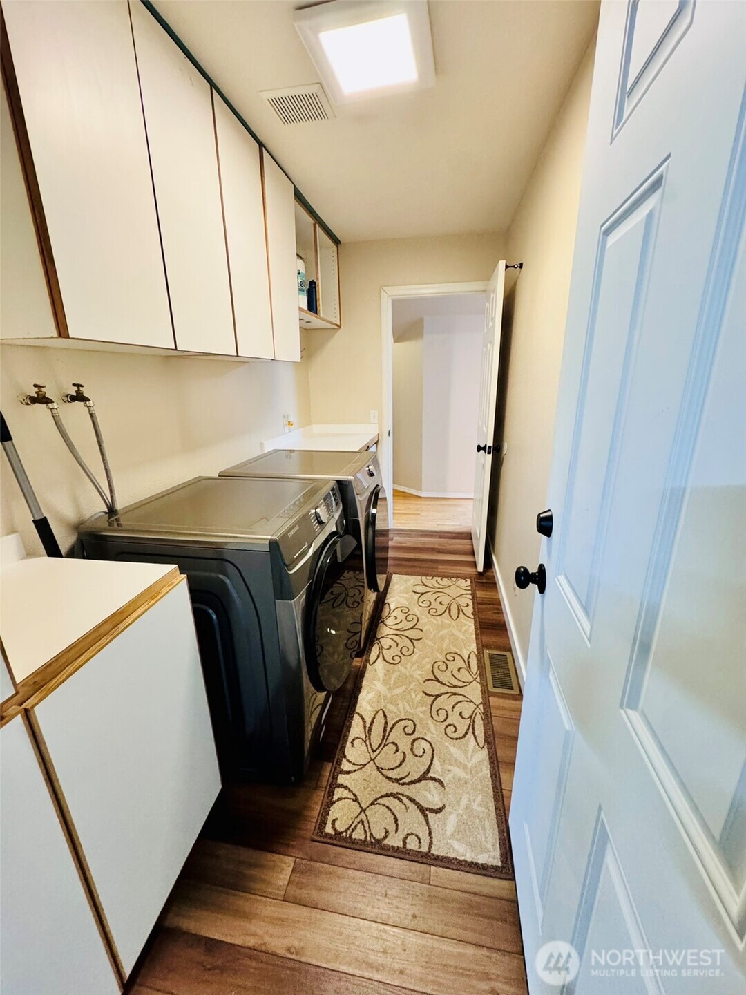 14444 Crescent Valley Road Southeast Olalla, WA 98359 - Photo 13 of 31 a view of utility room with washer and dryer