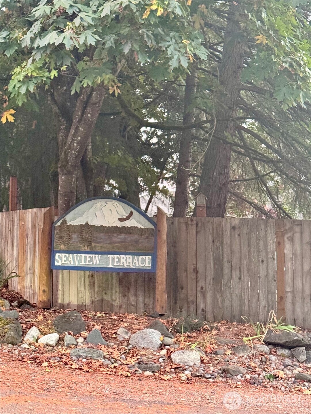 14444 Crescent Valley Road Southeast Olalla, WA 98359 - Photo 26 of 31 a view of a entrance gate of a house