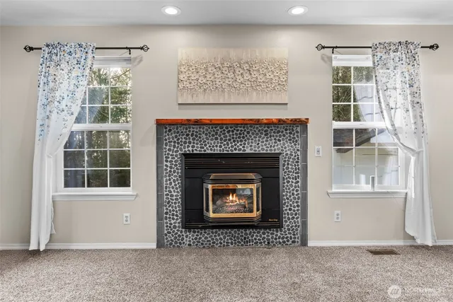 a workspace with furniture hardwood and a window
