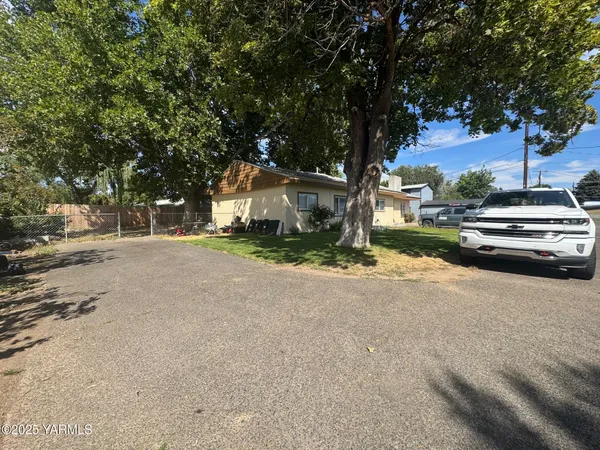 a view of a house with a street