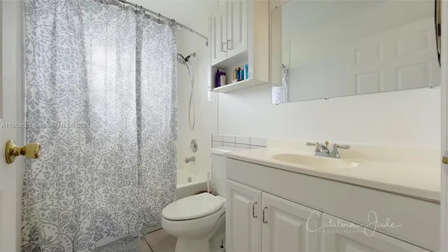 a view of a swimming pool with an outdoor space and seating area