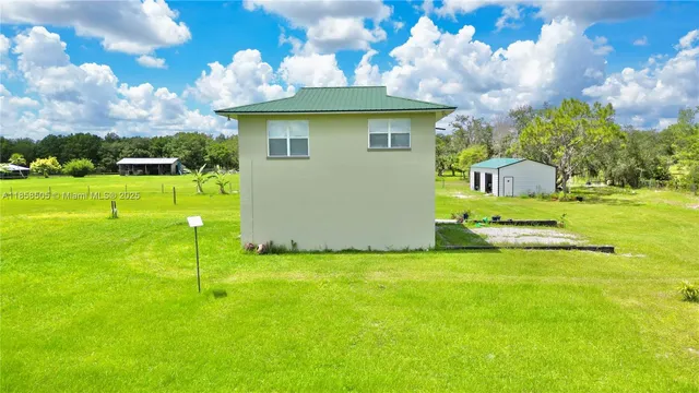 a kitchen with a sink stove and microwave