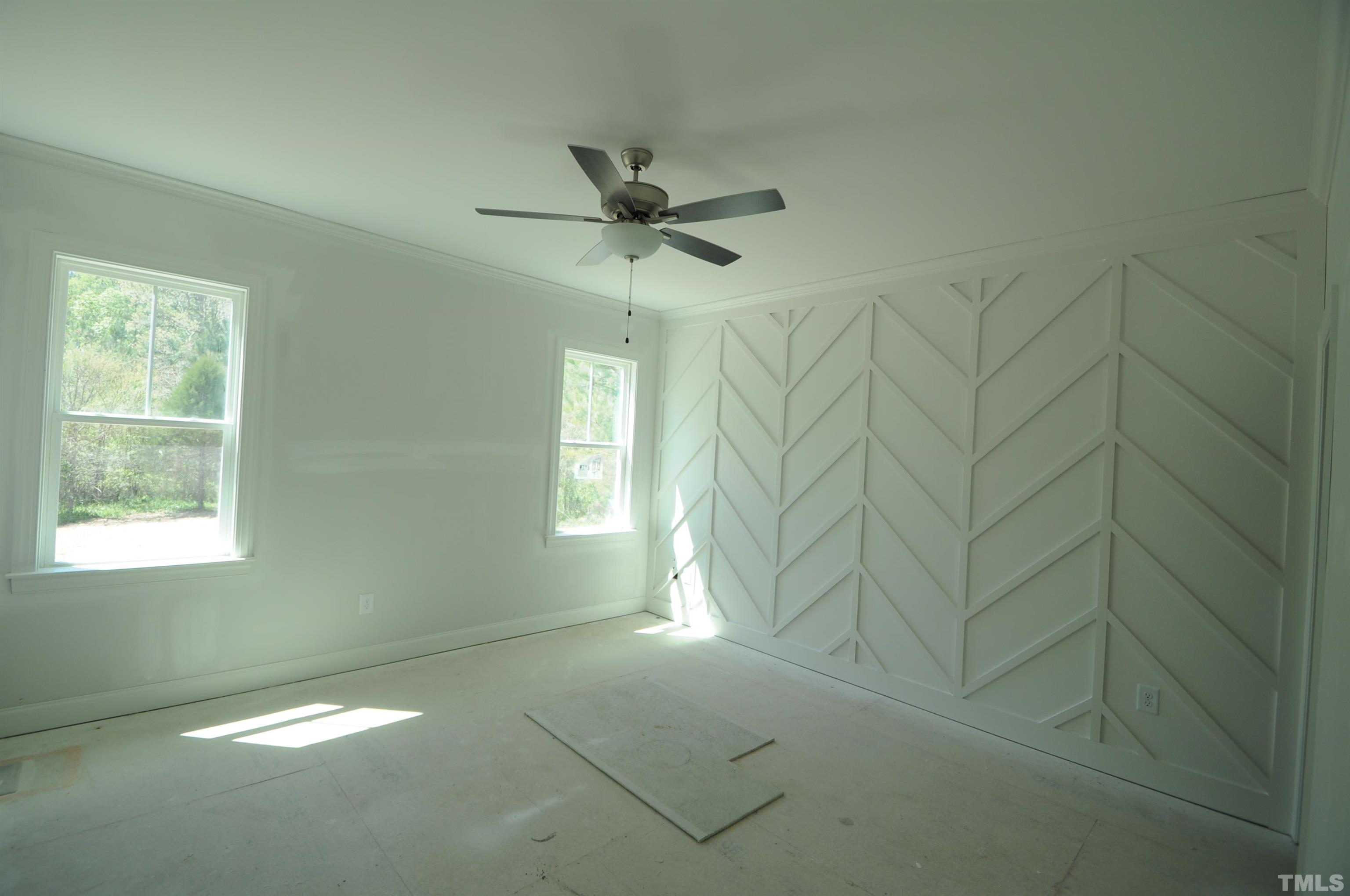 40 Pilot Ridge Road Zebulon, NC 27597 - Photo 6 of 11 a view of an empty room with a window