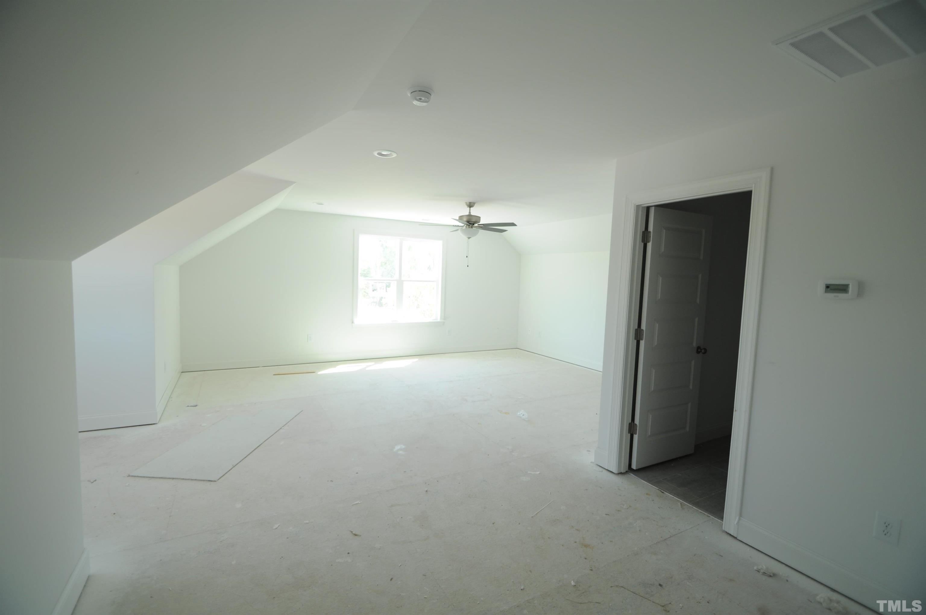 40 Pilot Ridge Road Zebulon, NC 27597 - Photo 9 of 11 an empty room with windows and closet