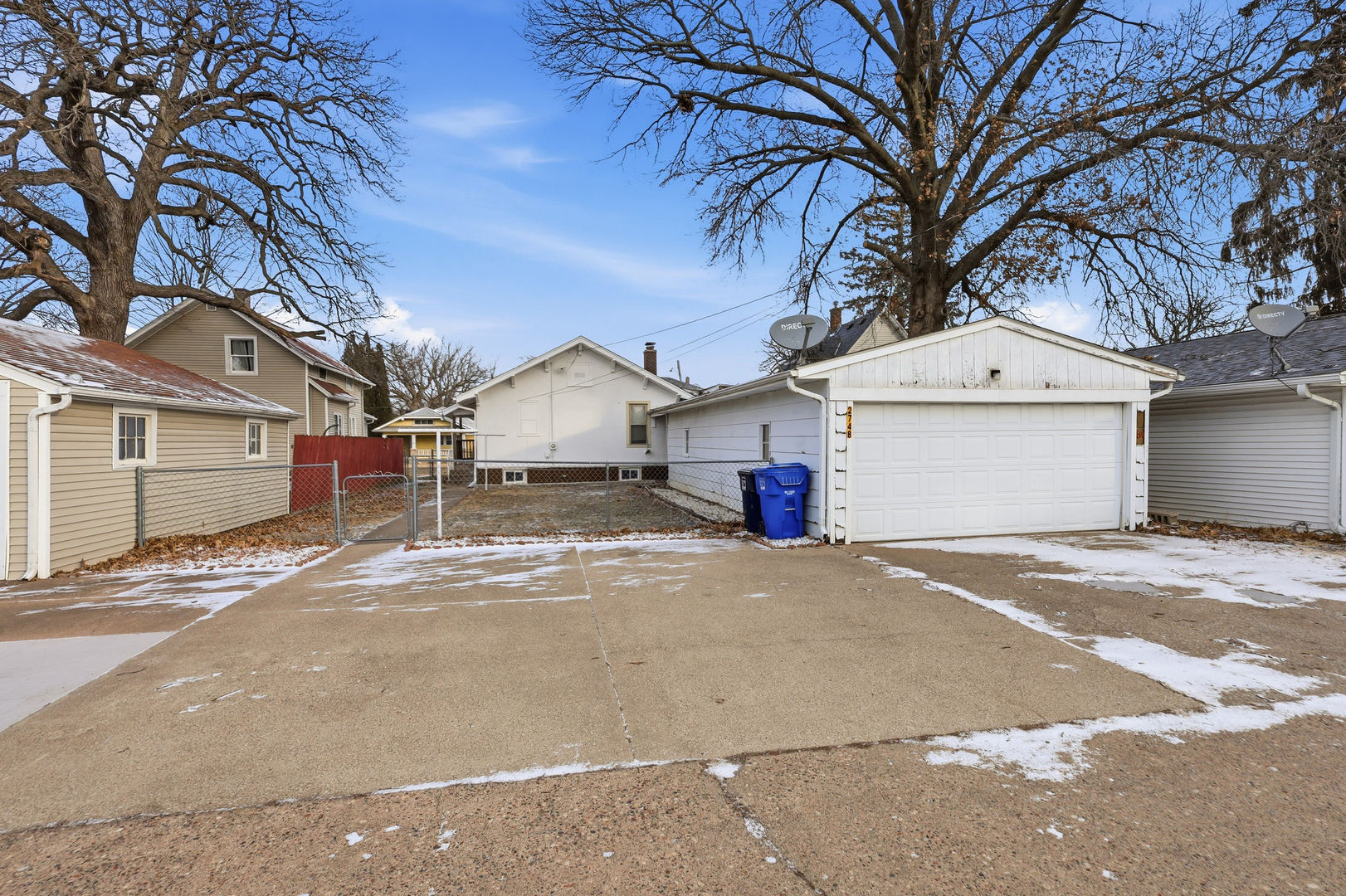 2748 12th Avenue Moline, IL 61265 - Photo 33 of 35 a front view of a house with a yard and garage