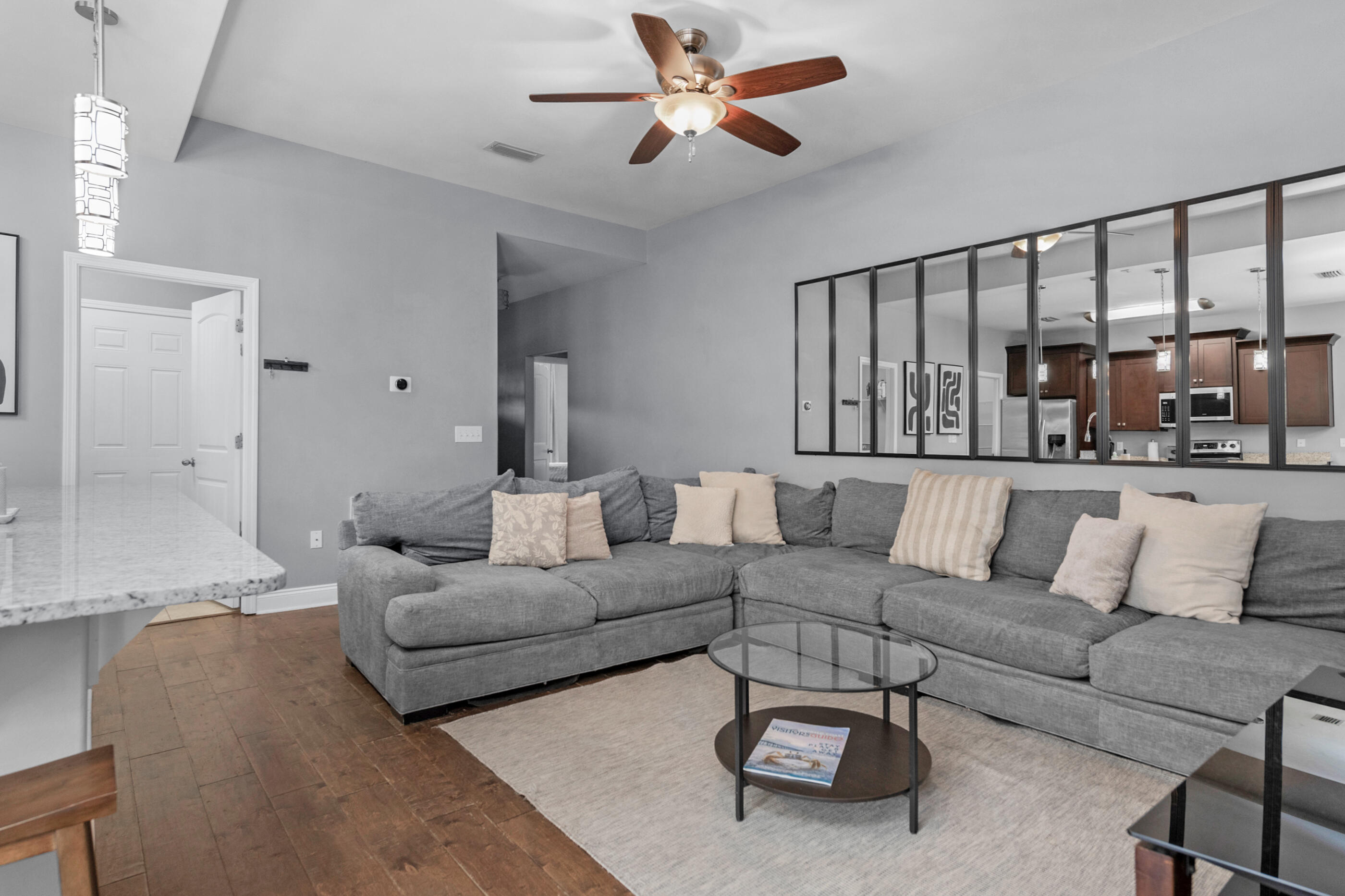2269 Tom Street Navarre, FL 32566 - Photo 14 of 40 a living room with furniture and a large window