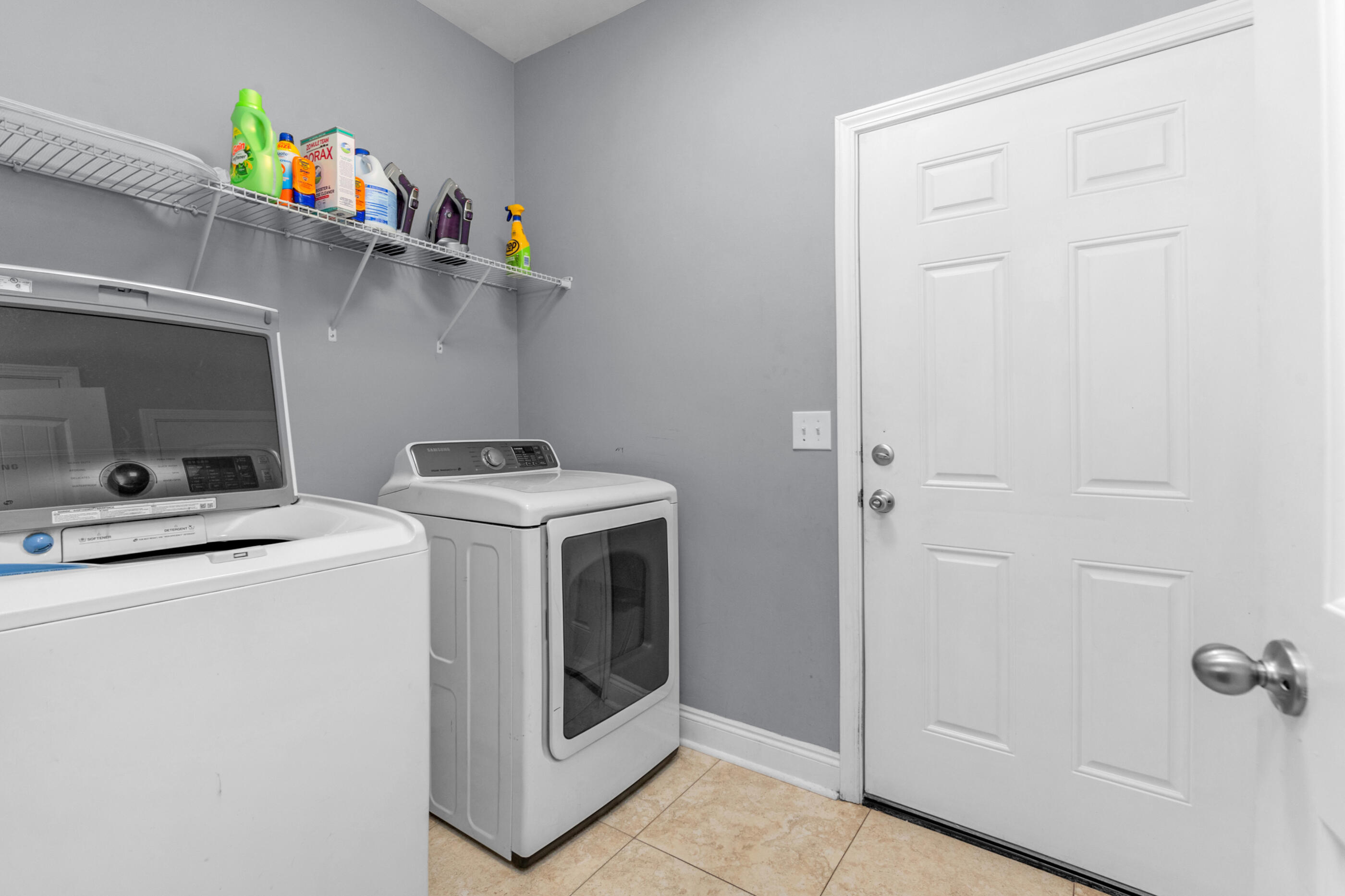 2269 Tom Street Navarre, FL 32566 - Photo 21 of 40 a utility room with dryer and washer