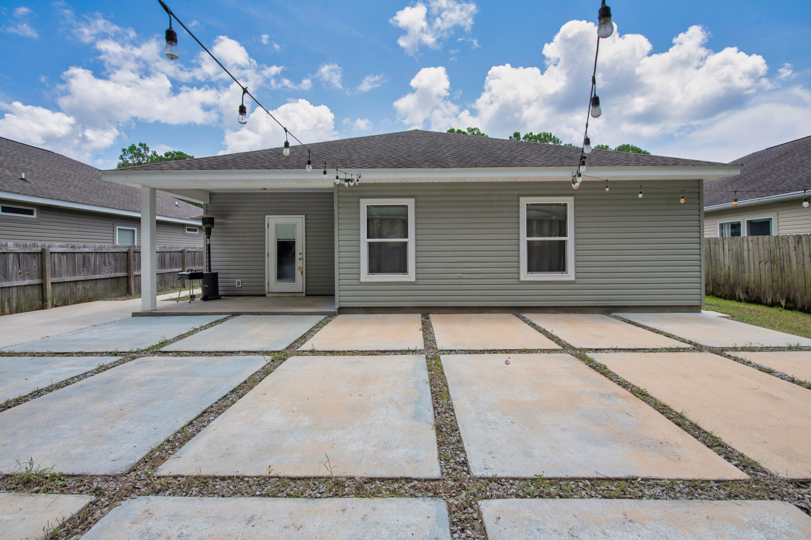 2269 Tom Street Navarre, FL 32566 - Photo 37 of 40 a view of a house with a window