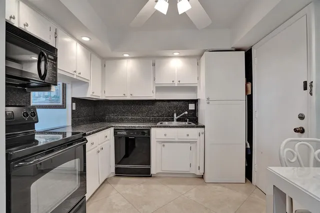 a view of an ocean beach and mountain