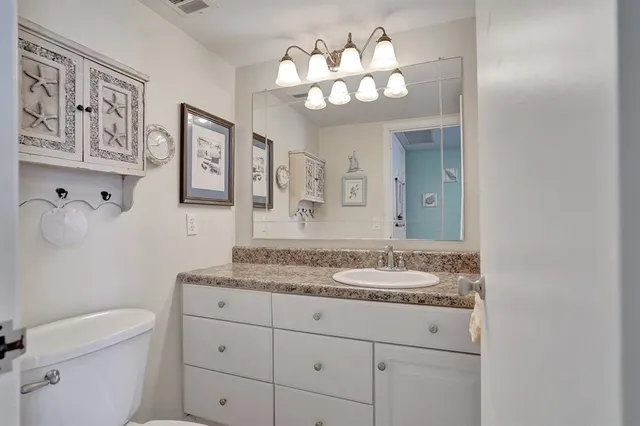 a view of a swimming pool with a lounge chairs