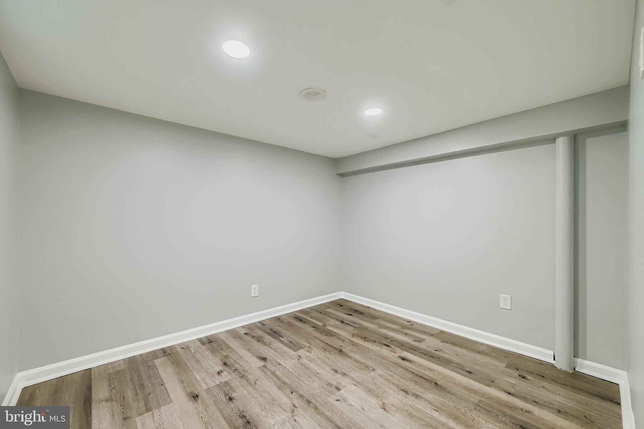 1229 North Point Road Dundalk, MD 21222 - Photo 19 of 28 a view of room with wooden floor