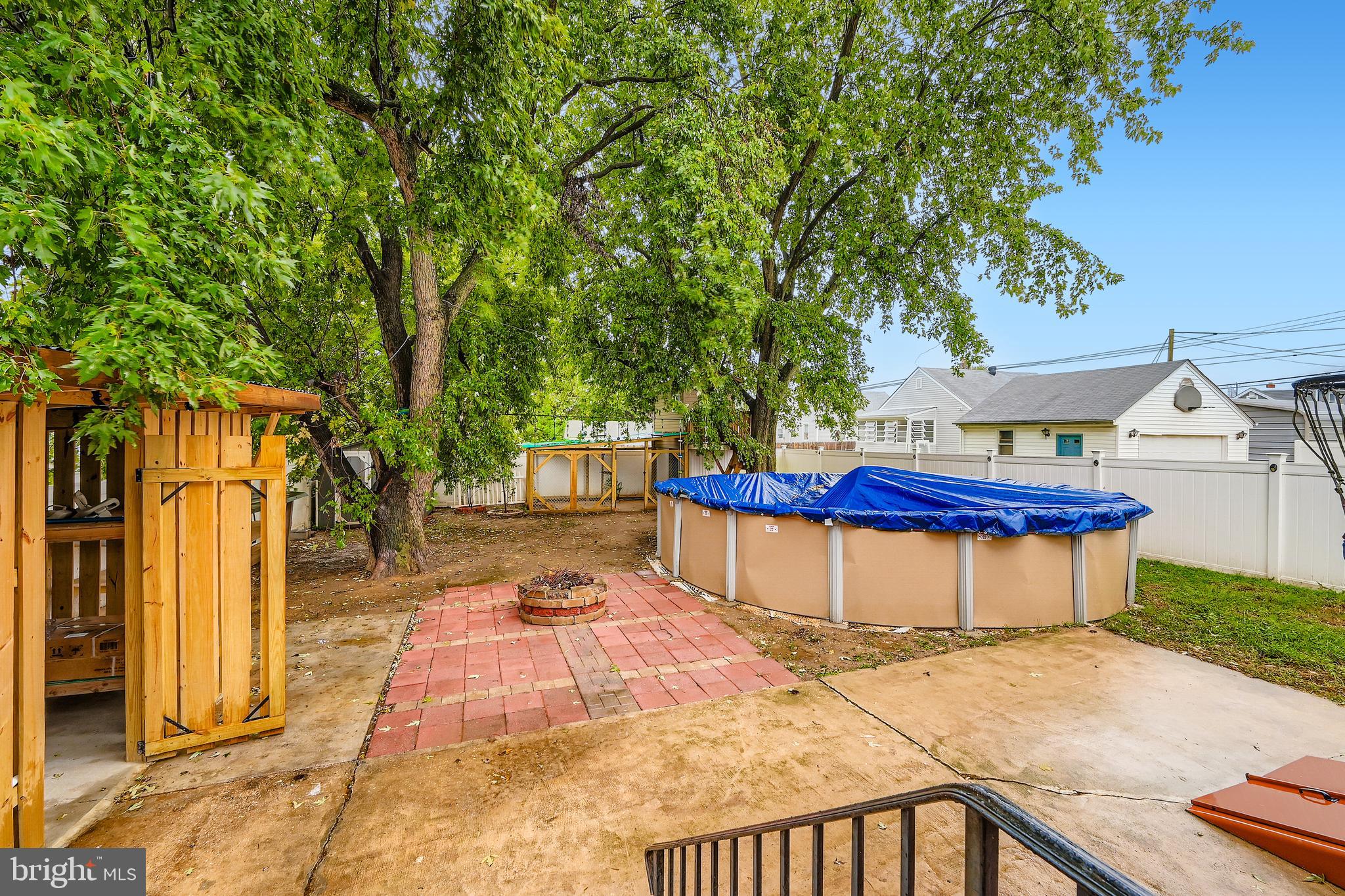 1229 North Point Road Dundalk, MD 21222 - Photo 25 of 28 a view of a swimming pool with a patio