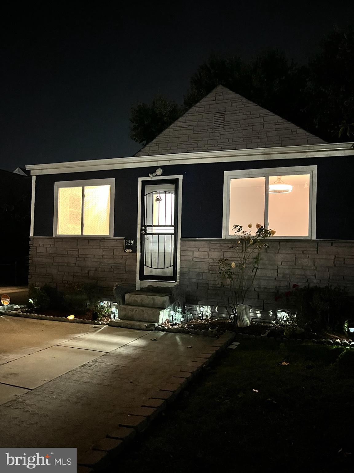 1229 North Point Road Dundalk, MD 21222 - Photo 28 of 28 a front view of a house with yard