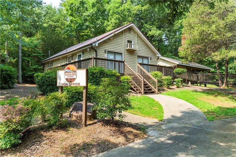 967 Raccoon Ridge Northeast Ranger, GA 30734 - Photo 20 of 36 a view of a big house with a big yard plants and large trees
