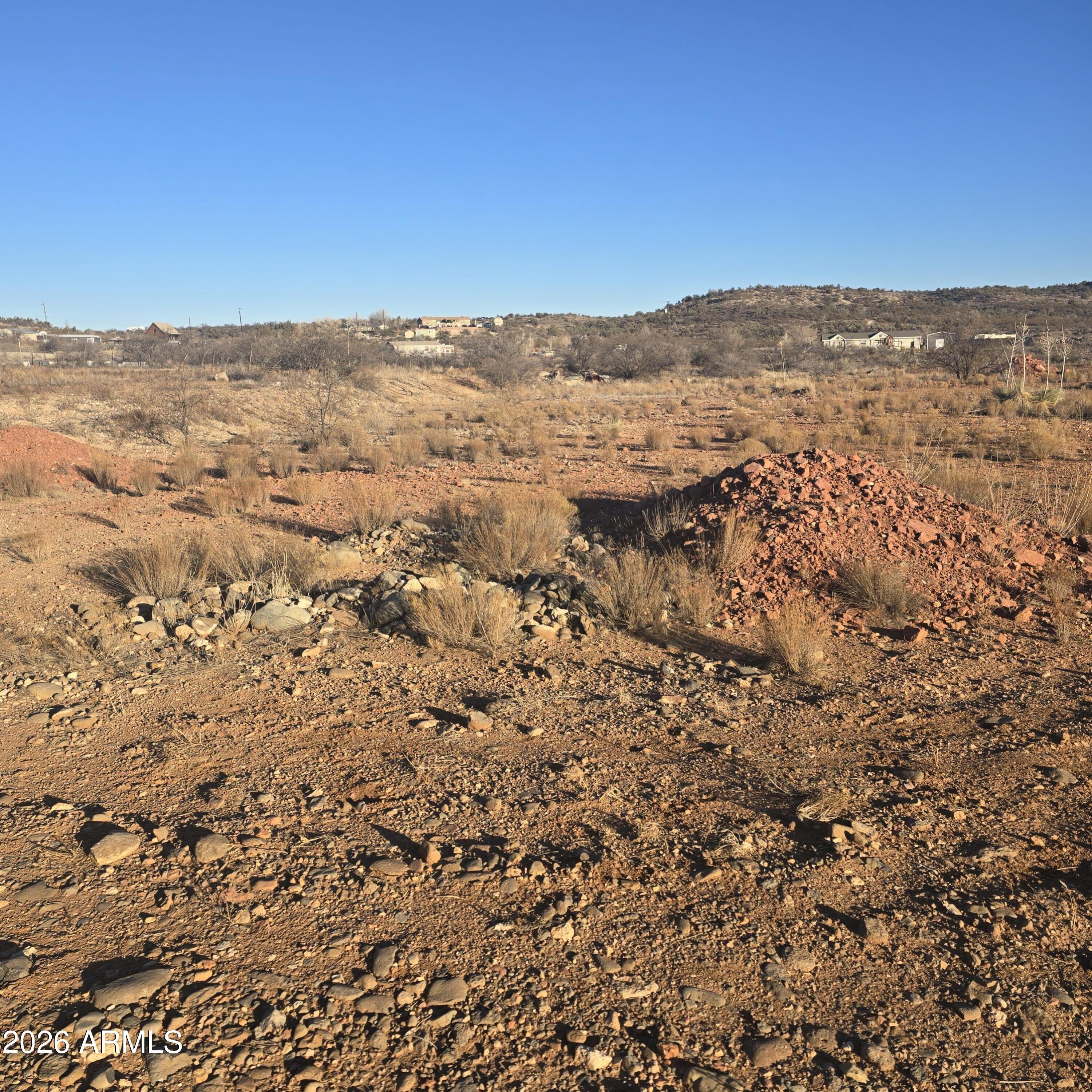 0 Sunburst Farm Road Rimrock, AZ 86335 - Photo 2 of 11 an aerial view of houses with yard and mountain view in back