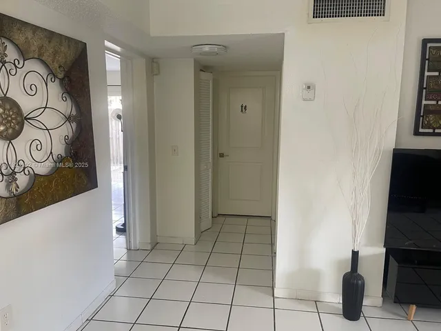 a bathroom with a sink toilet and mirror