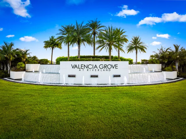 a view of outdoor space with swimming pool and seating