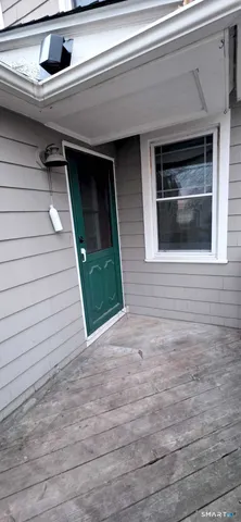 a front view of a house with a garage