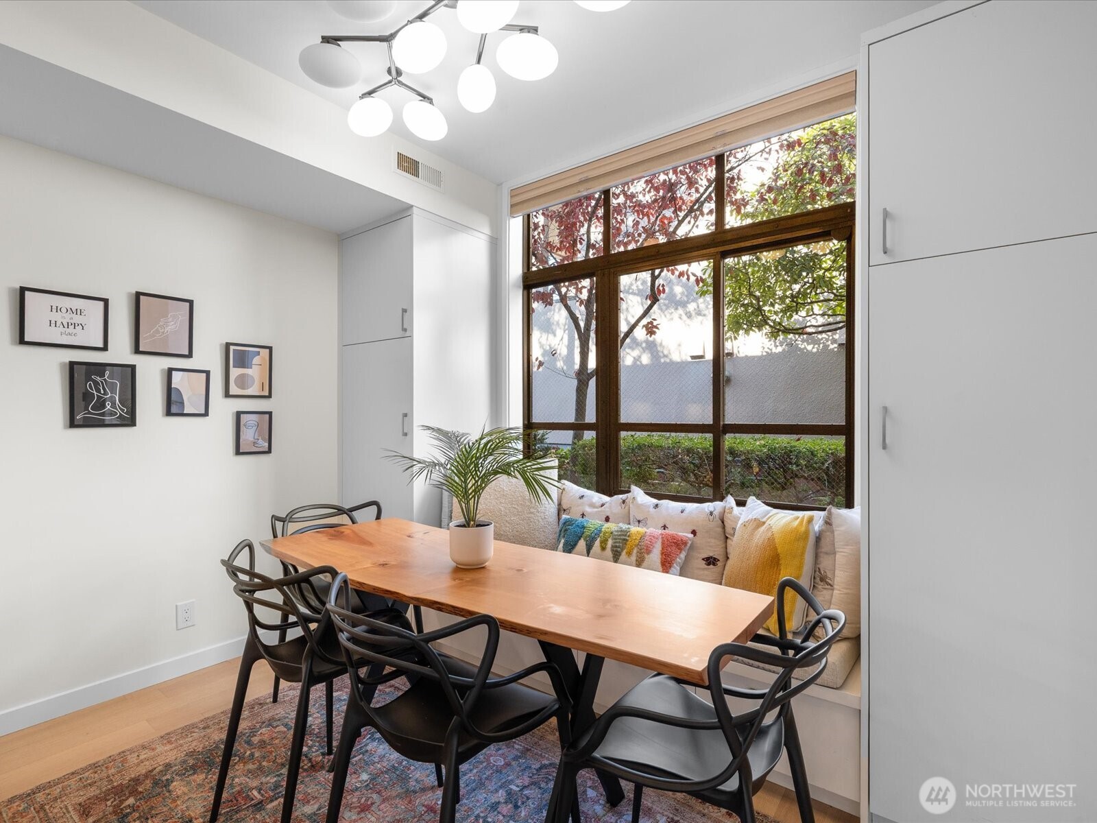 88 Virginia Street, Unit 3 Seattle, WA 98121 - Photo 13 of 40 a view of a dining room with furniture window and outside view