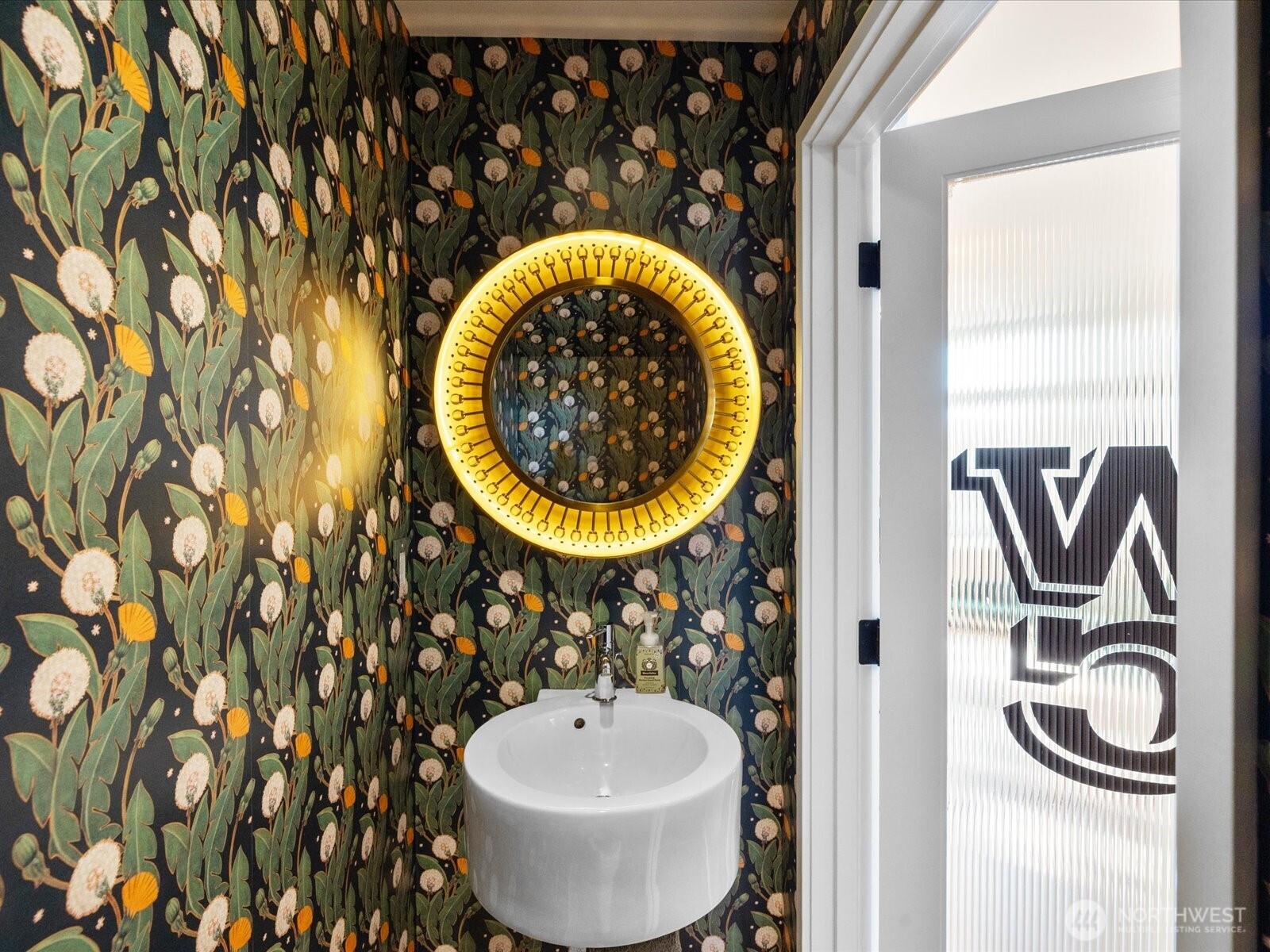 88 Virginia Street, Unit 3 Seattle, WA 98121 - Photo 16 of 40 a bathroom with a sink and a mirror