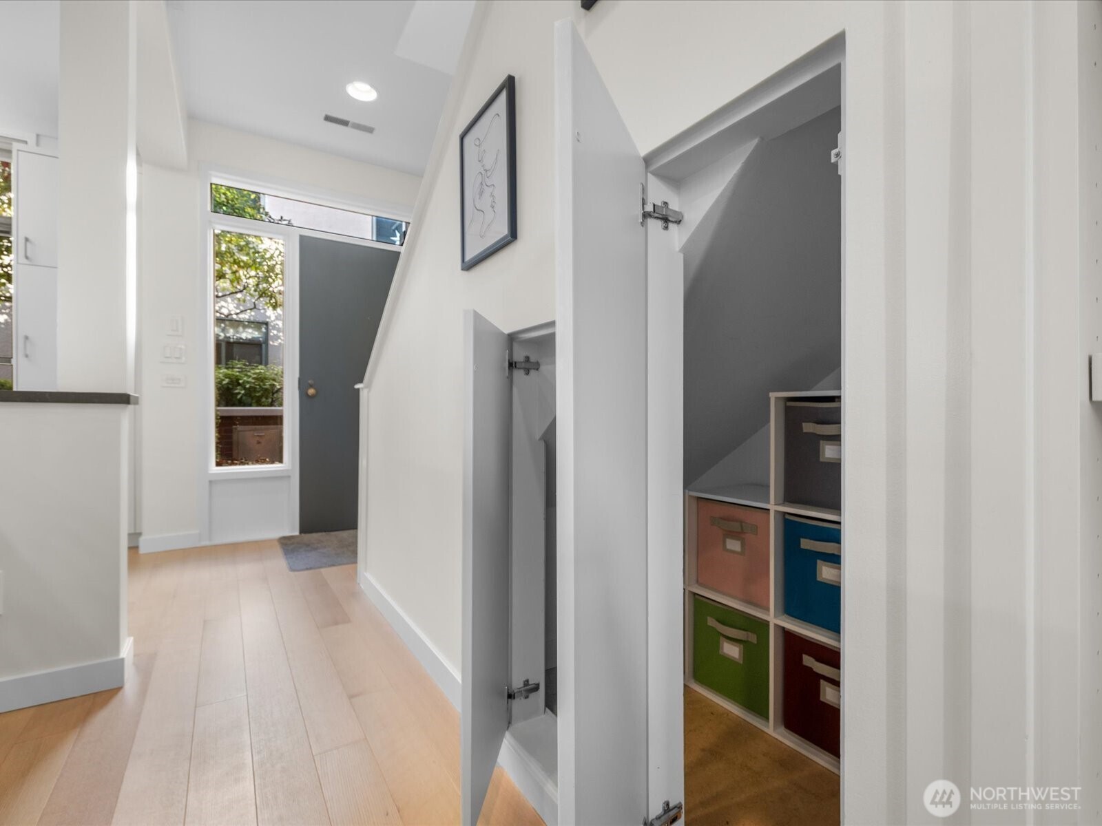 88 Virginia Street, Unit 3 Seattle, WA 98121 - Photo 17 of 40 a view of hallway with walk in closet and livingroom view