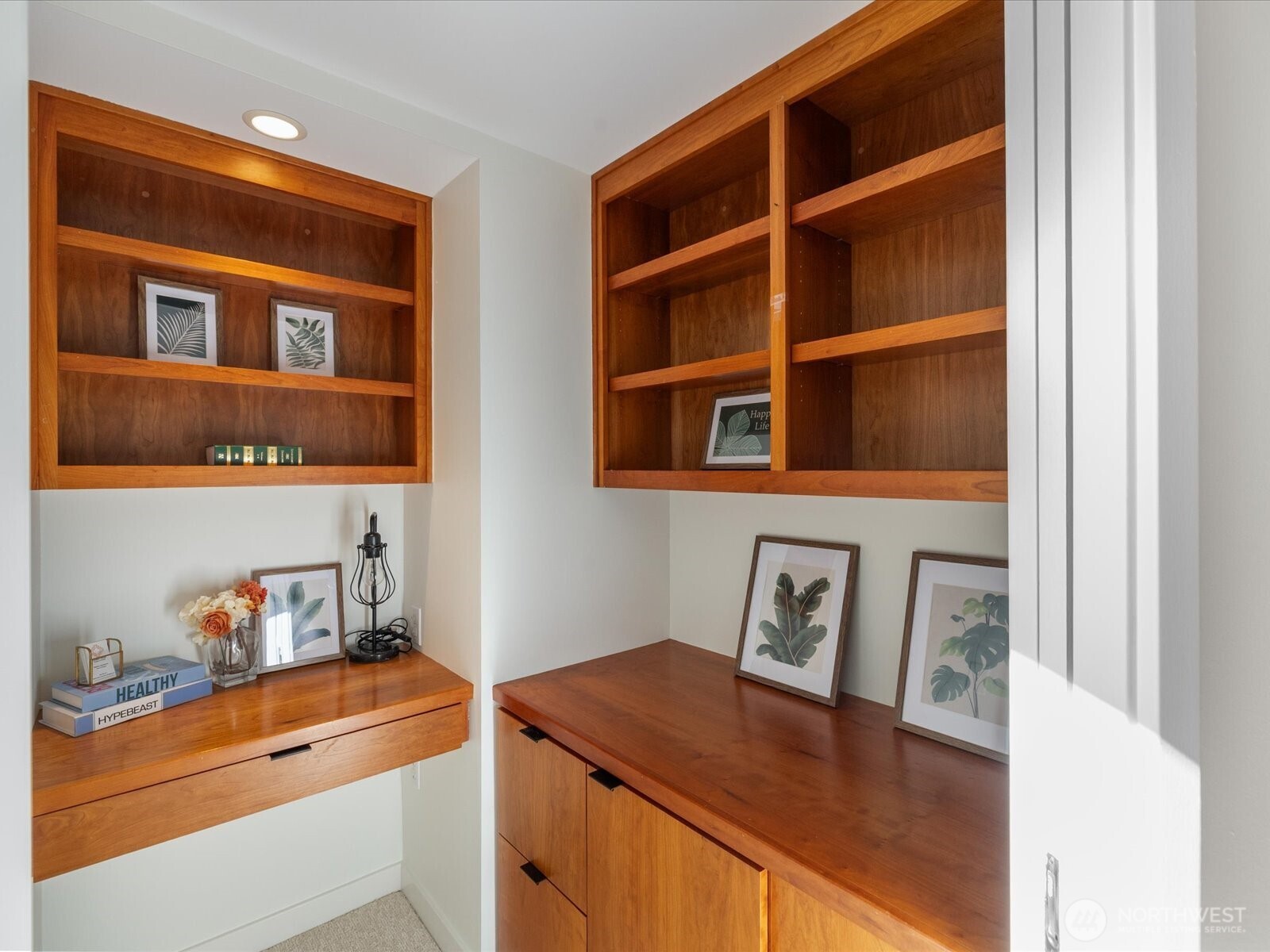 88 Virginia Street, Unit 3 Seattle, WA 98121 - Photo 25 of 40 a view of kitchen cabinets and wooden floor