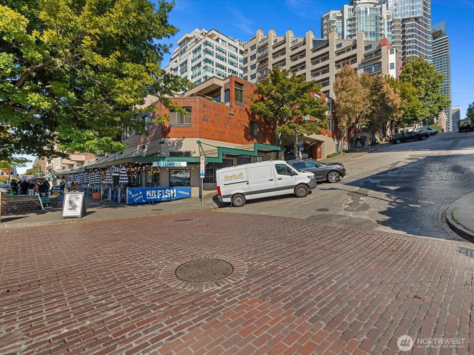 88 Virginia Street, Unit 3 Seattle, WA 98121 - Photo 38 of 40 a building with trees in front of it