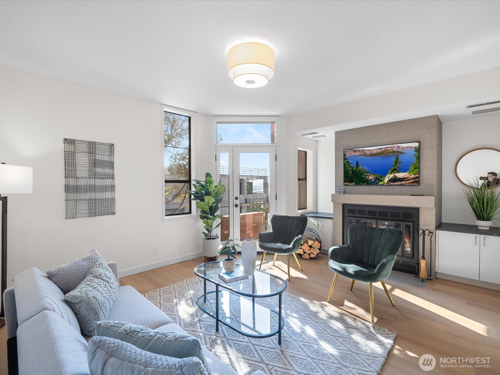 88 Virginia Street, Unit 3 Seattle, WA 98121 - Photo 6 of 40 a living room with furniture and a fireplace