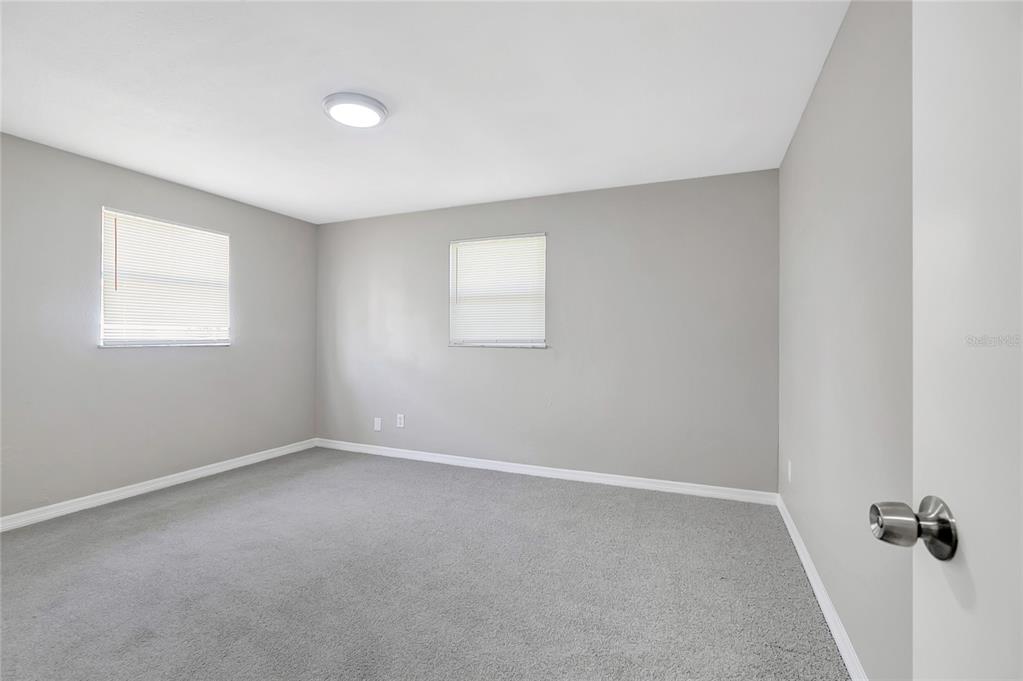 5900 Beech Street Zephyrhills, FL 33542 - Photo 25 of 37 an empty room with a window