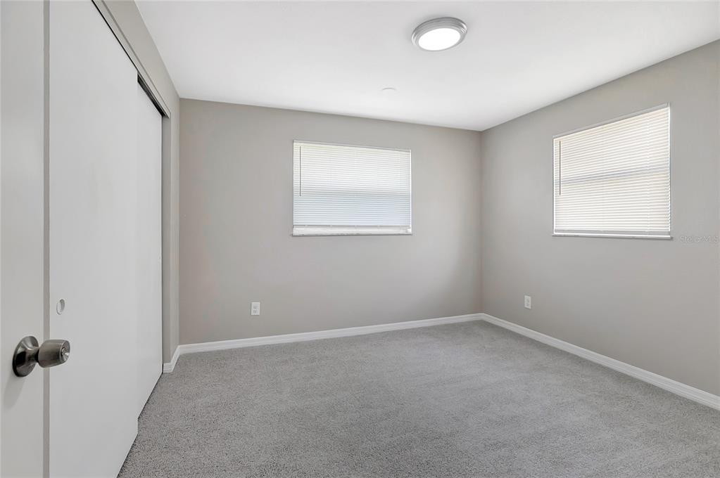 5900 Beech Street Zephyrhills, FL 33542 - Photo 30 of 37 an empty room with a window