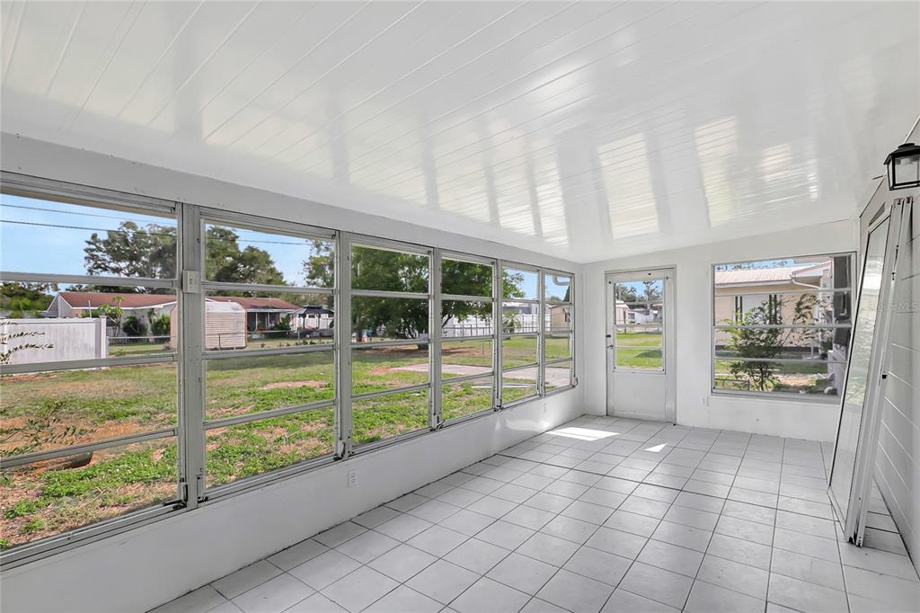 5900 Beech Street Zephyrhills, FL 33542 - Photo 32 of 37 a large white building with a outdoor space