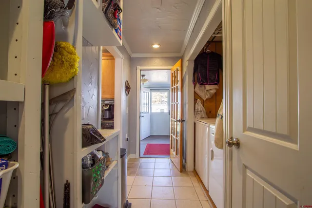 a view of a hallway and interior of the house